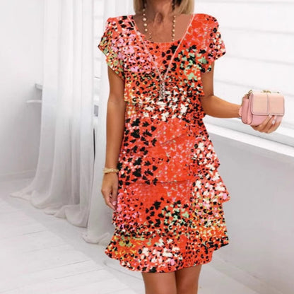 Jonna – Elegant dress with leopard pattern and sequins